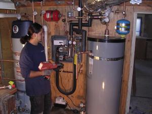 mesa water heater repair technician finishes a job